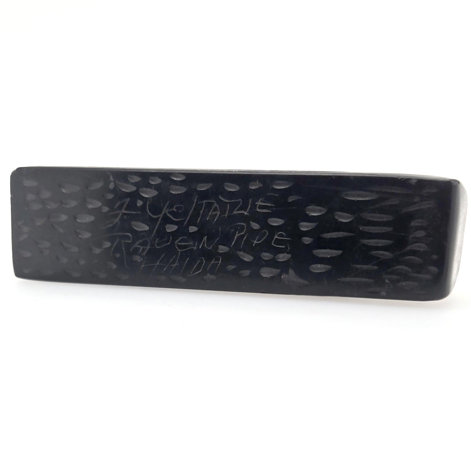 Argillite Pipe by Haida artist Fred Yeltatzie