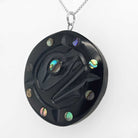argillite full moon pendant by haida artist amy edgars