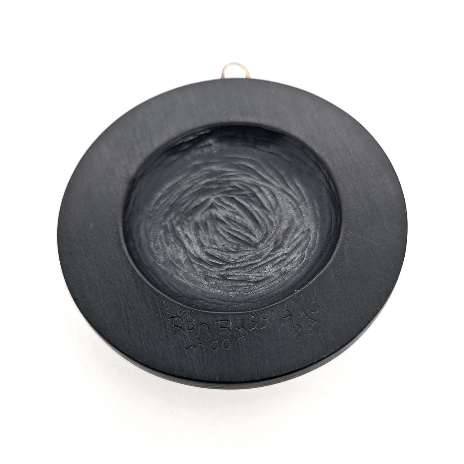 Argillite Moon Pendant by Haida artist Ron Russ