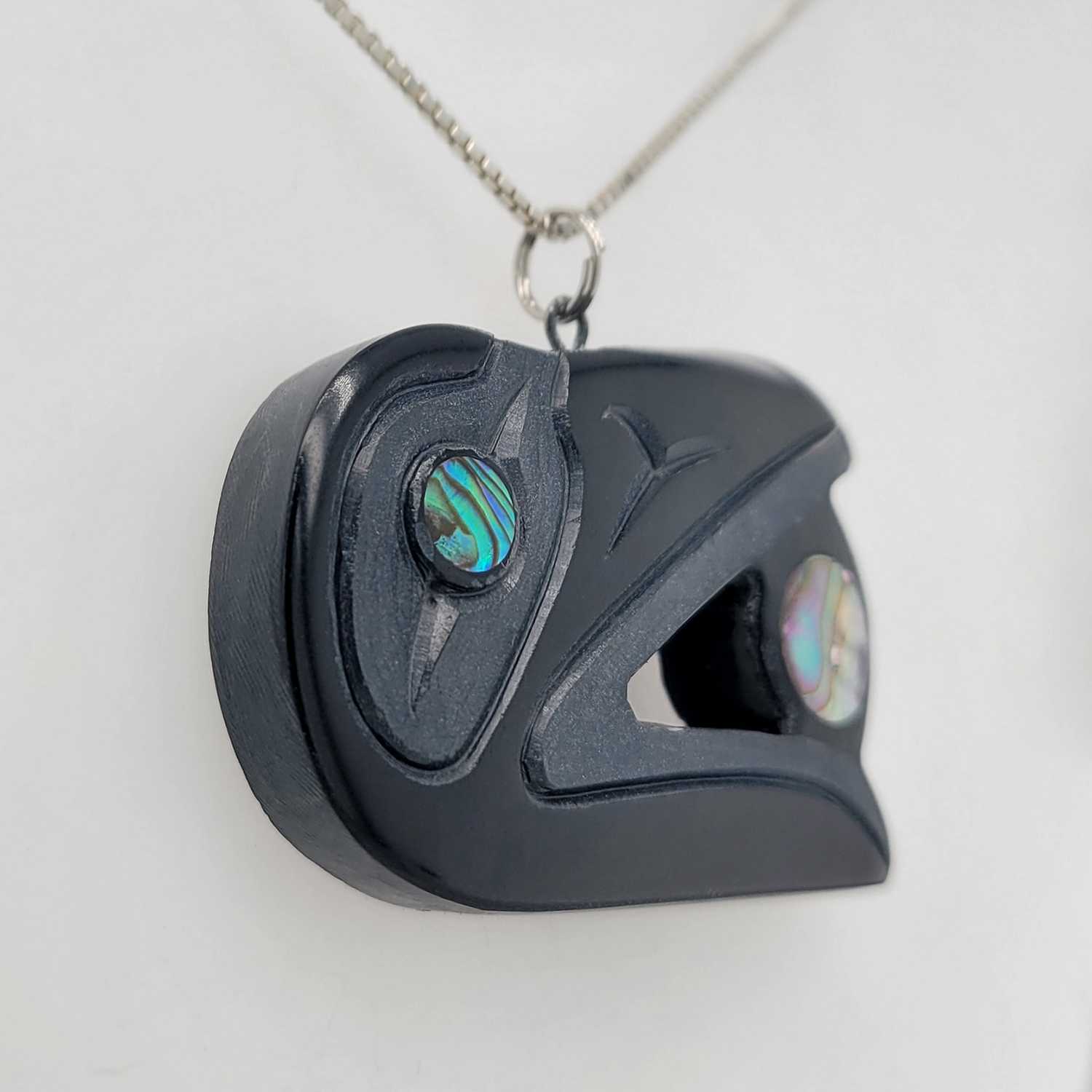 Argillite Raven and the Light Pendant by Haida artist Amy Edgars