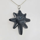 Native Argillite Sun Pendant by Haida artist Amy Edgars