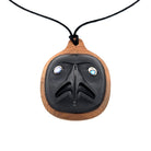 Argillite and Yew Eagle Pendant by Haida artist Ron Russ