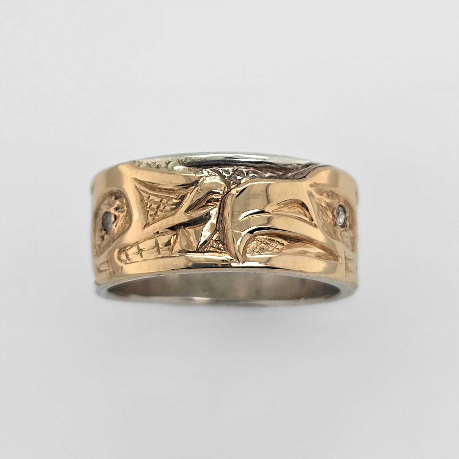 silver and gold wedding band with diamonds by Bill Helin