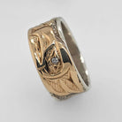 silver and gold wedding band with diamonds by Bill Helin