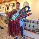 Kwakwaka'wakw artist Raymond Shaw holding his Crooked Beak Headdress