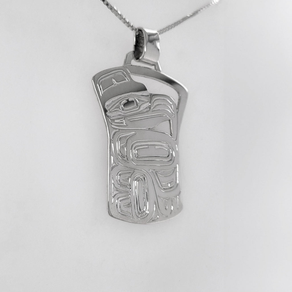 this is a Silver Haida Copper-shaped Eagle Pendant