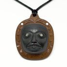 Argillite and Yew Noblewoman Pendant by Haida artist Ron Russ