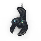 argillite hummingbird pendant by Haida artist Amy Edgars