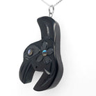 argillite hummingbird pendant by Haida artist Amy Edgars