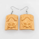 Cedar Frog Earrings by Haida artist Leon Ridley