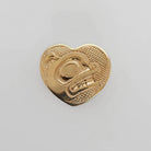 Indigenous Gold Bear Pendant by Haida artist Carmen Goertzen