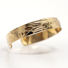 Gold Dolphins Bracelet by Tsimshian artist Bill Helin
