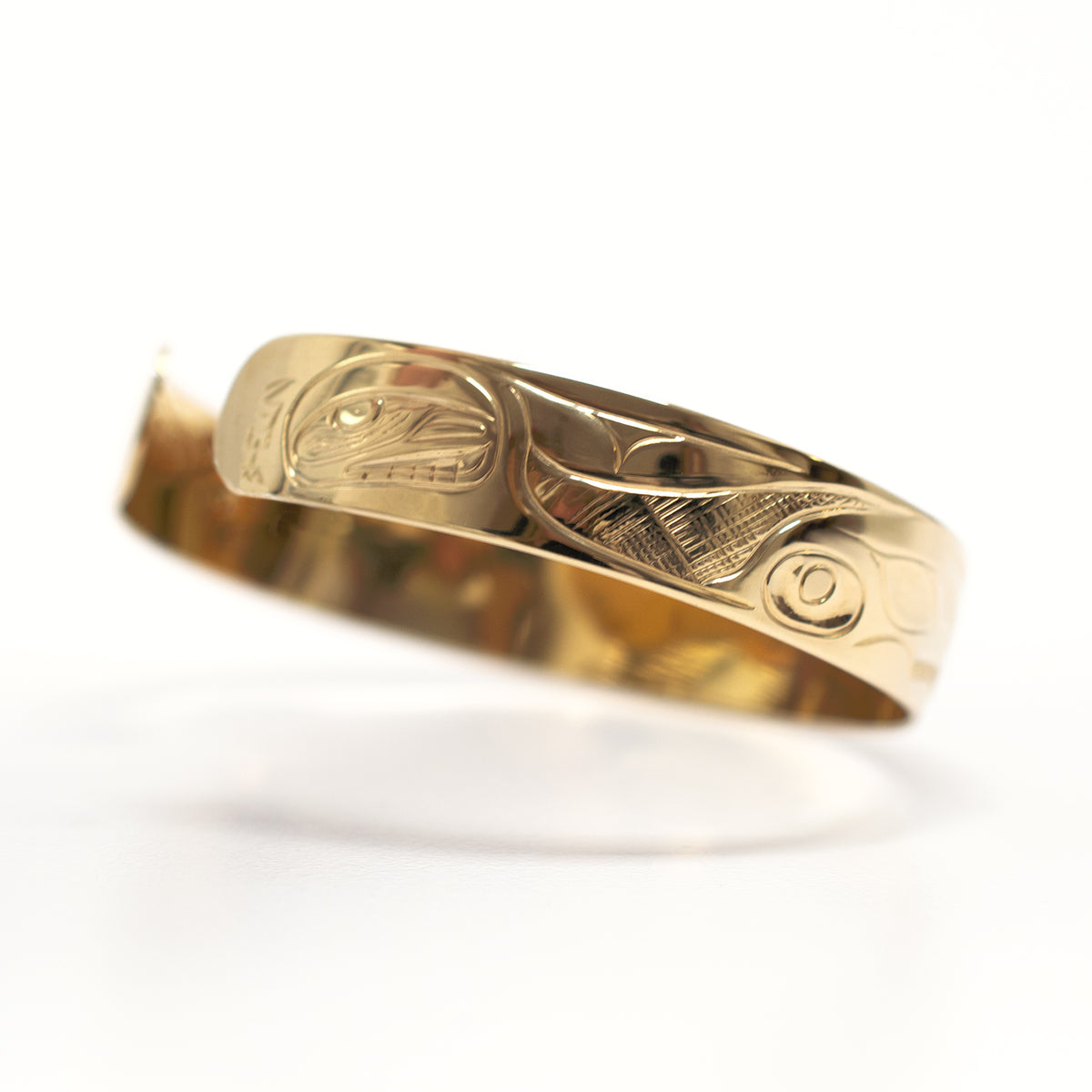 Gold Dolphins Bracelet by Tsimshian artist Bill Helin