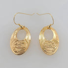 Gold Eagle Earrings by Tsimshian artist Bill Helin