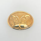 Gold Eagles Brooch by Haida artist Carmen Goertzen