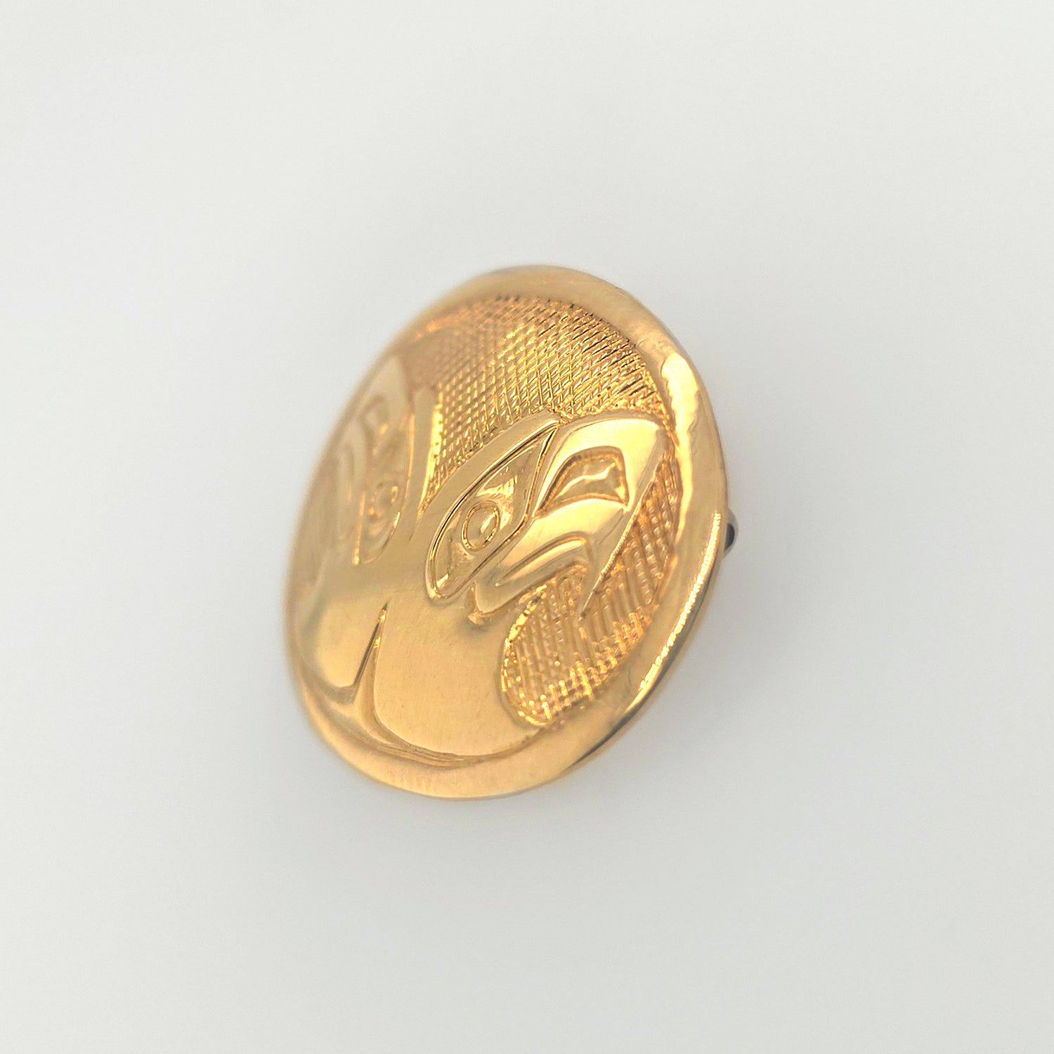 Gold Eagles Brooch by Haida artist Carmen Goertzen