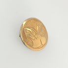 Gold Eagles Brooch by Haida artist Carmen Goertzen