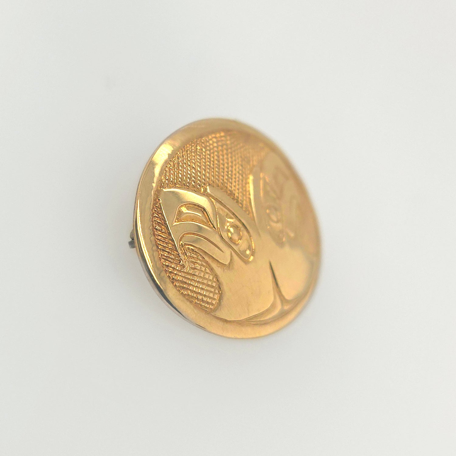 Gold Eagles Brooch by Haida artist Carmen Goertzen