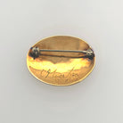 Gold Eagles Brooch by Haida artist Carmen Goertzen
