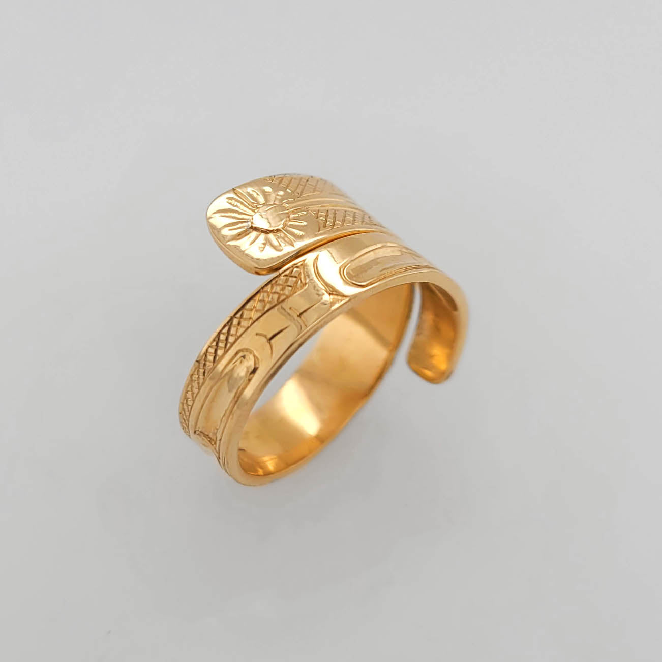 Gold Hummingbird Wrap Ring by Haida artist Carmen Goertzen