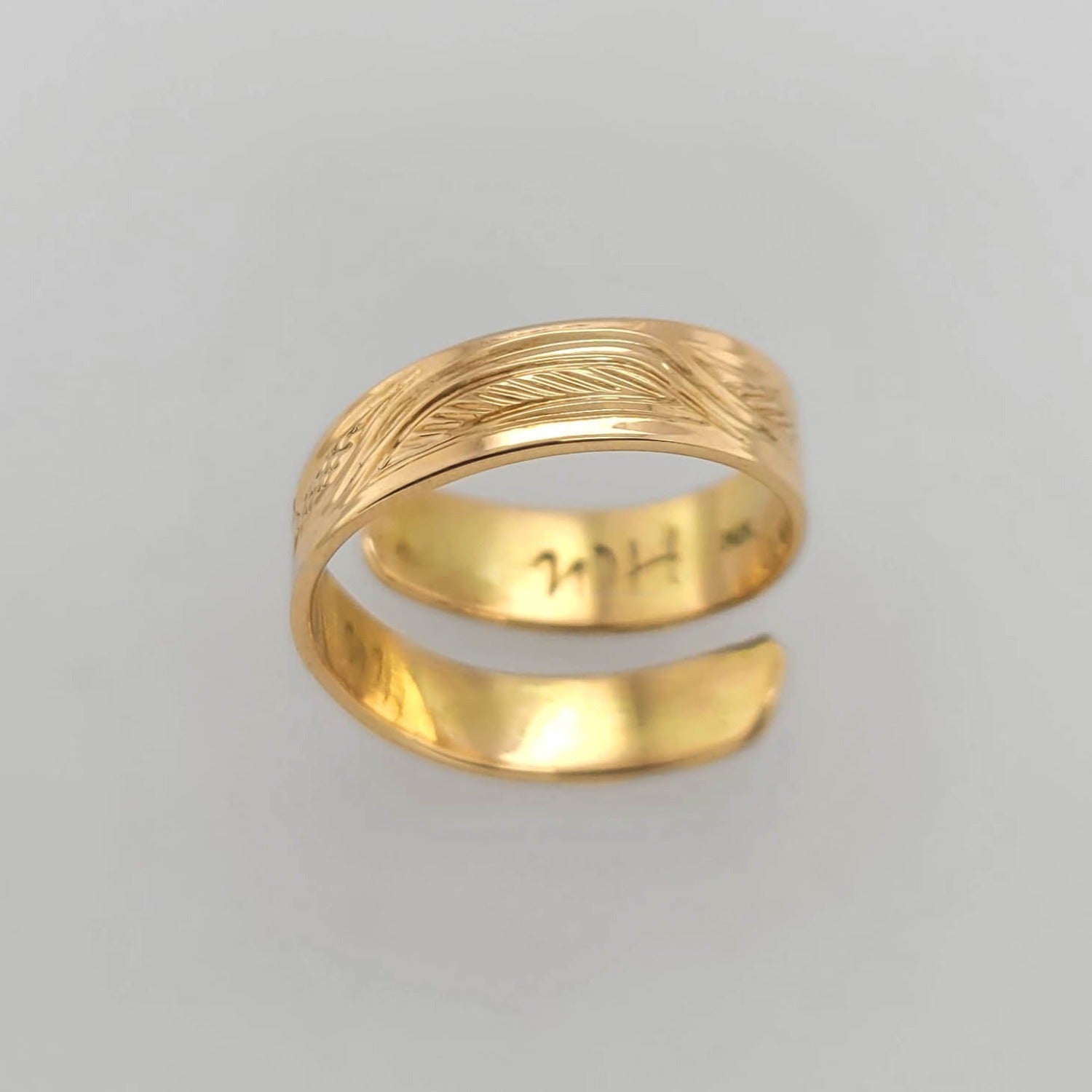 Gold Hummingbird Wrap Ring by Tsimshian artist Bill Helin