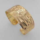 Gold Moon Embracing the Sun Bracelet by Tsimshian artist Bill Helin