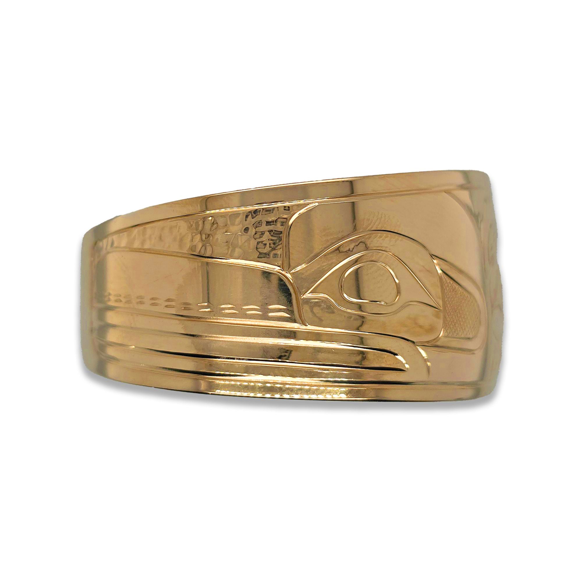 Gold Orca and Raven Bracelet by Coast Salish/Kwakwaka'wakw artist Noel Brown