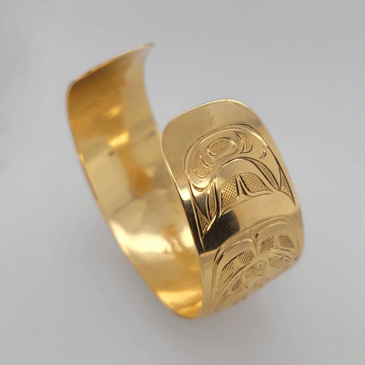 Gold Phases of the Moon Bracelet by Kwakwaka'wakw artist Joe Wilson