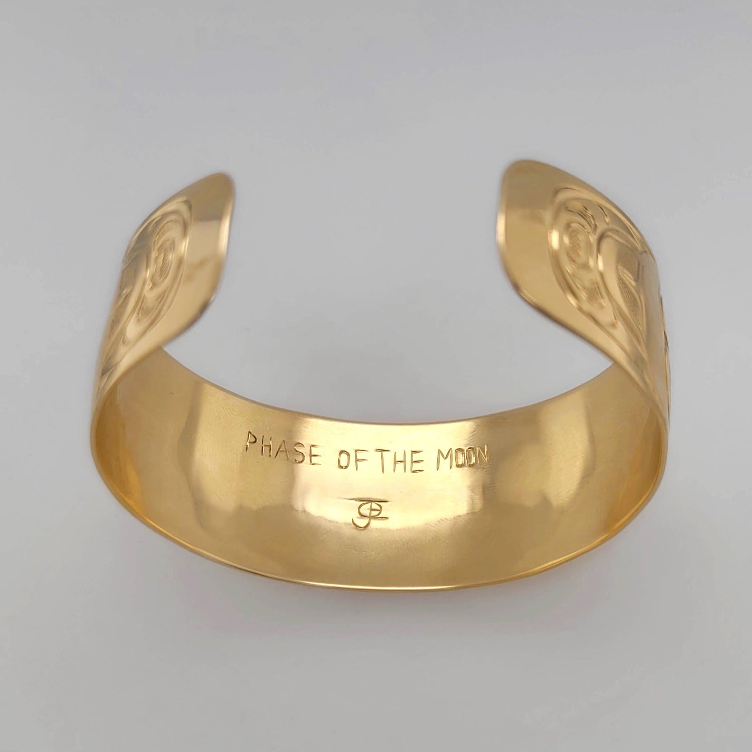 Gold Phases of the Moon Bracelet by Kwakwaka'wakw artist Joe Wilson