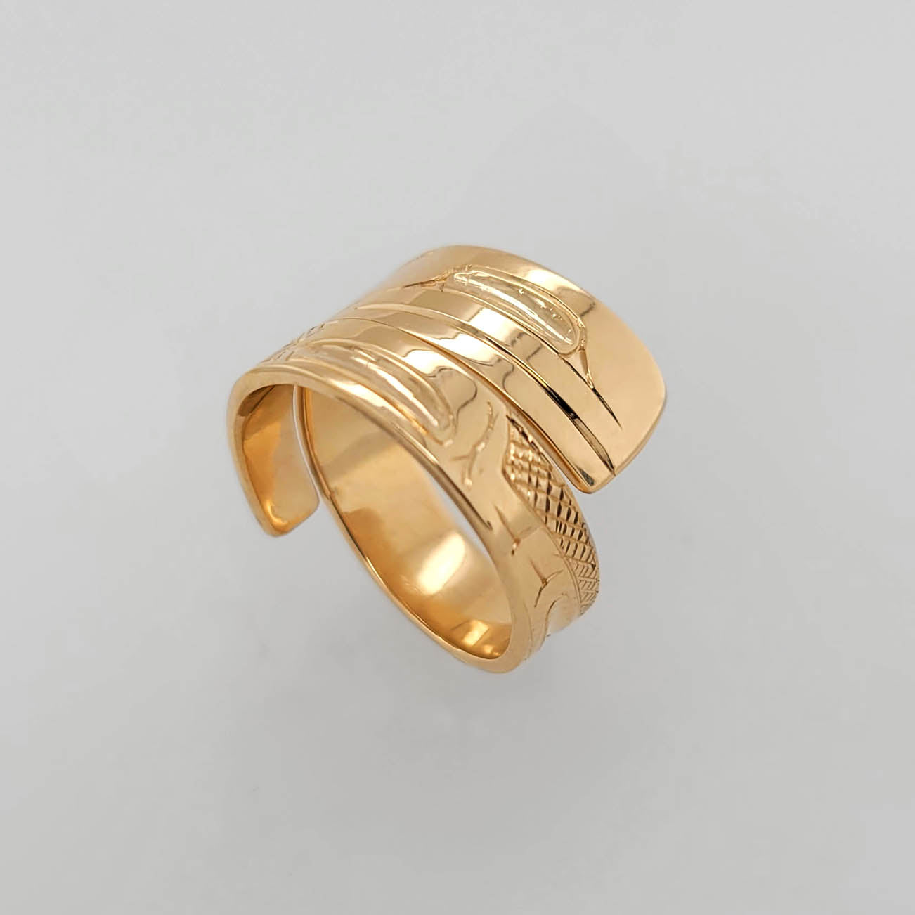 Gold Raven Wrap Ring by Haida artist Carmen Goertzen