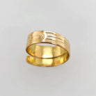 Gold Raven Wrap Ring by Haida artist Garner Moody