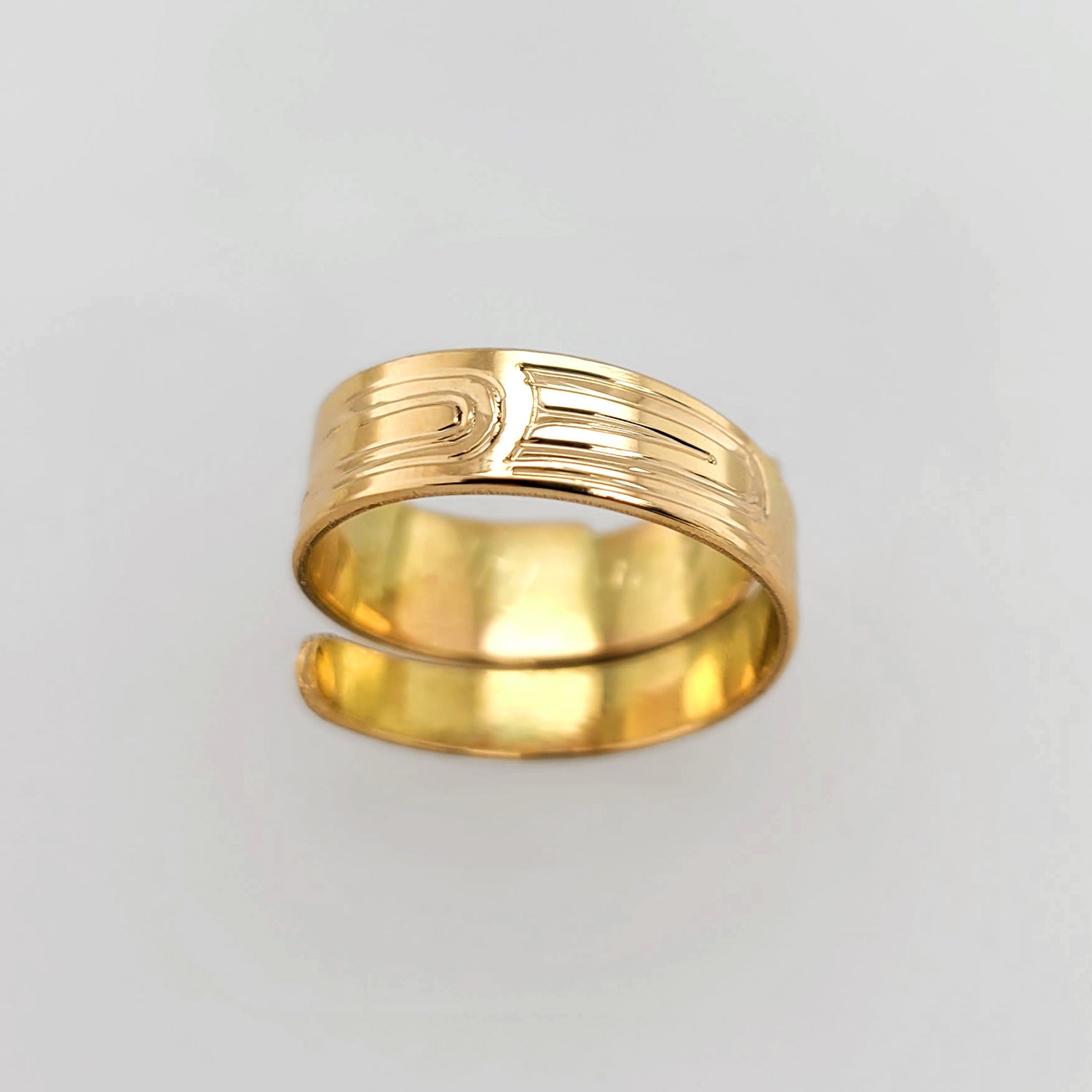 Gold Raven Wrap Ring by Haida artist Garner Moody