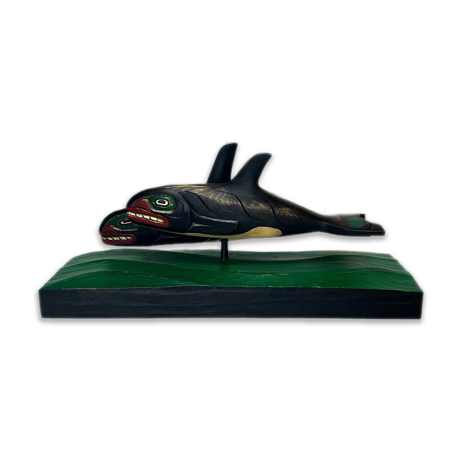 Killer Whales sculpture by Kwakwaka'wakw artist Greg Henderson