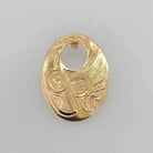 Gold Hummingbird Pendant by Tsimshian artist Bill Helin