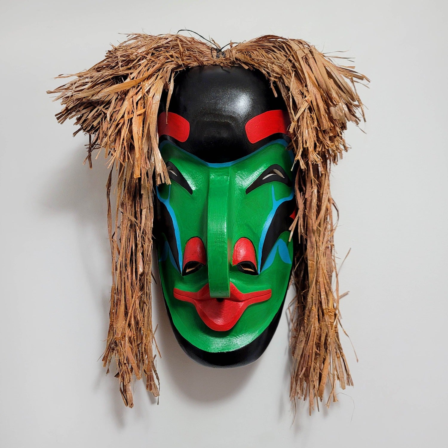 Pitch Woman Mask by Nuu-chah-nulth artist Russell Tate