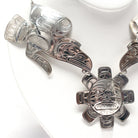 Silver Ravens and Sun Necklace by Kwakwaka'wakw artist Don Lancaster