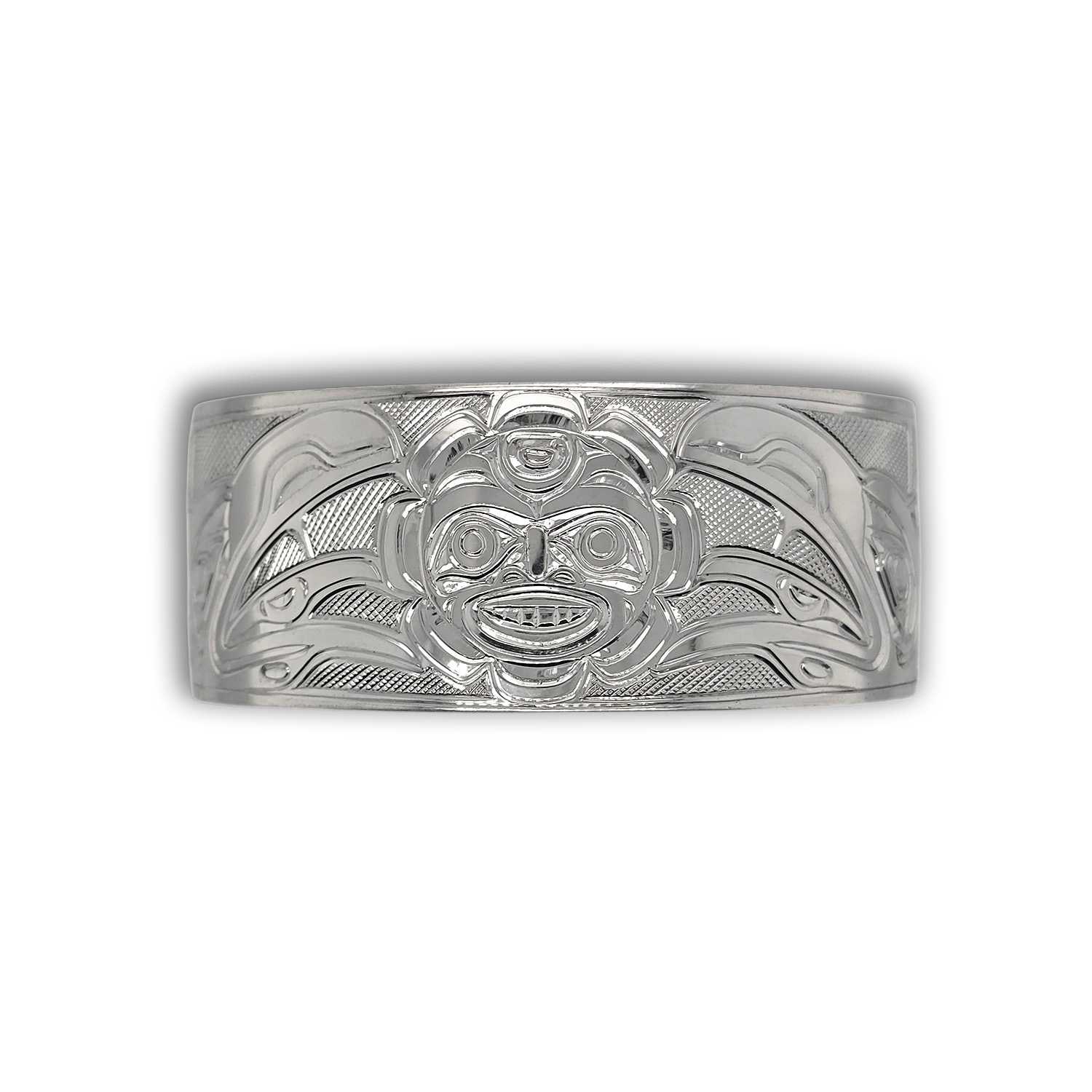 Ravens and Sun Bracelet by Kwakwaka'wakw artist Chris Cook