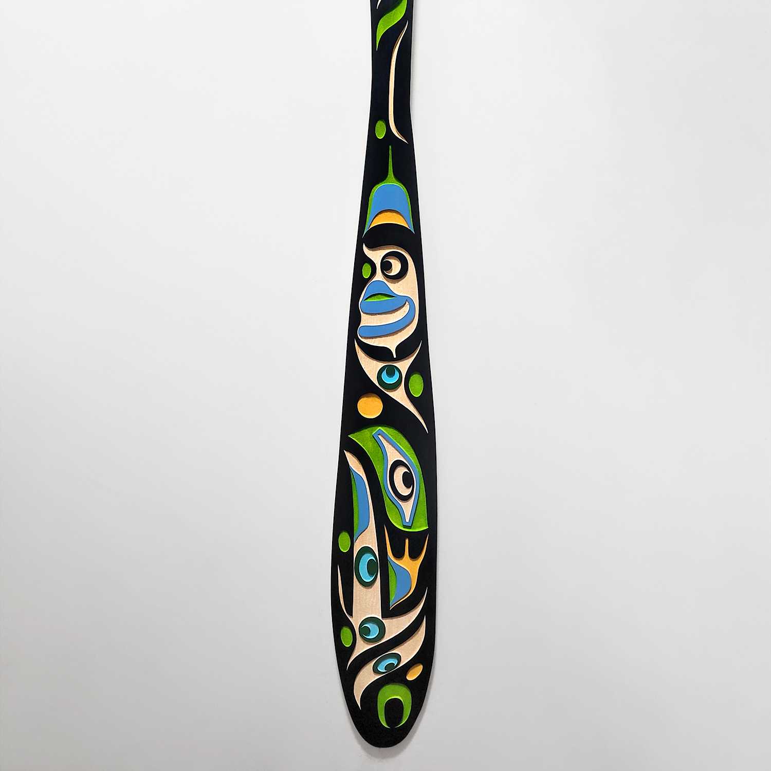 Sandblasted Cedar Raven Paddle by Kwakiutl carver Trevor Hunt