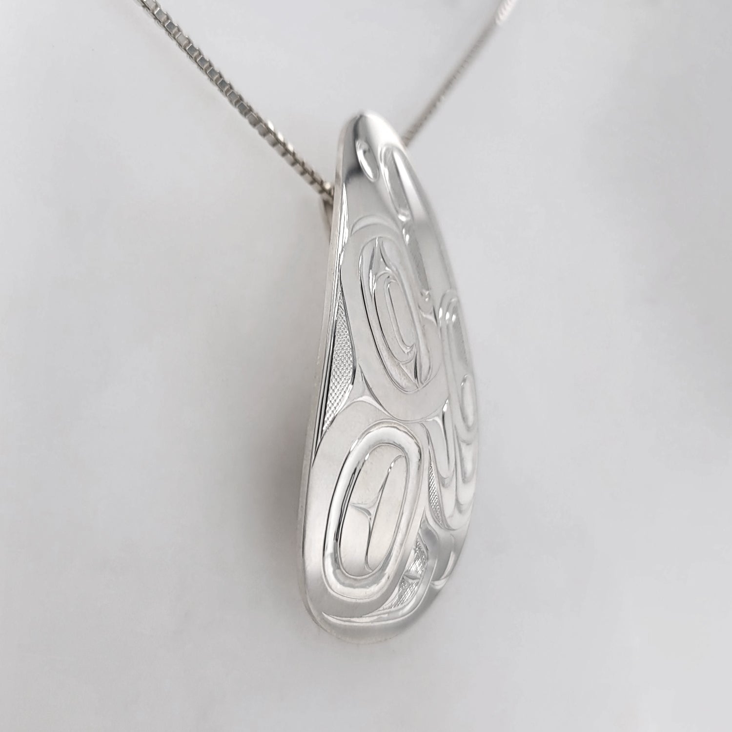 Silver Eagle Pendant by Nuxalk artist Kelly Robinson