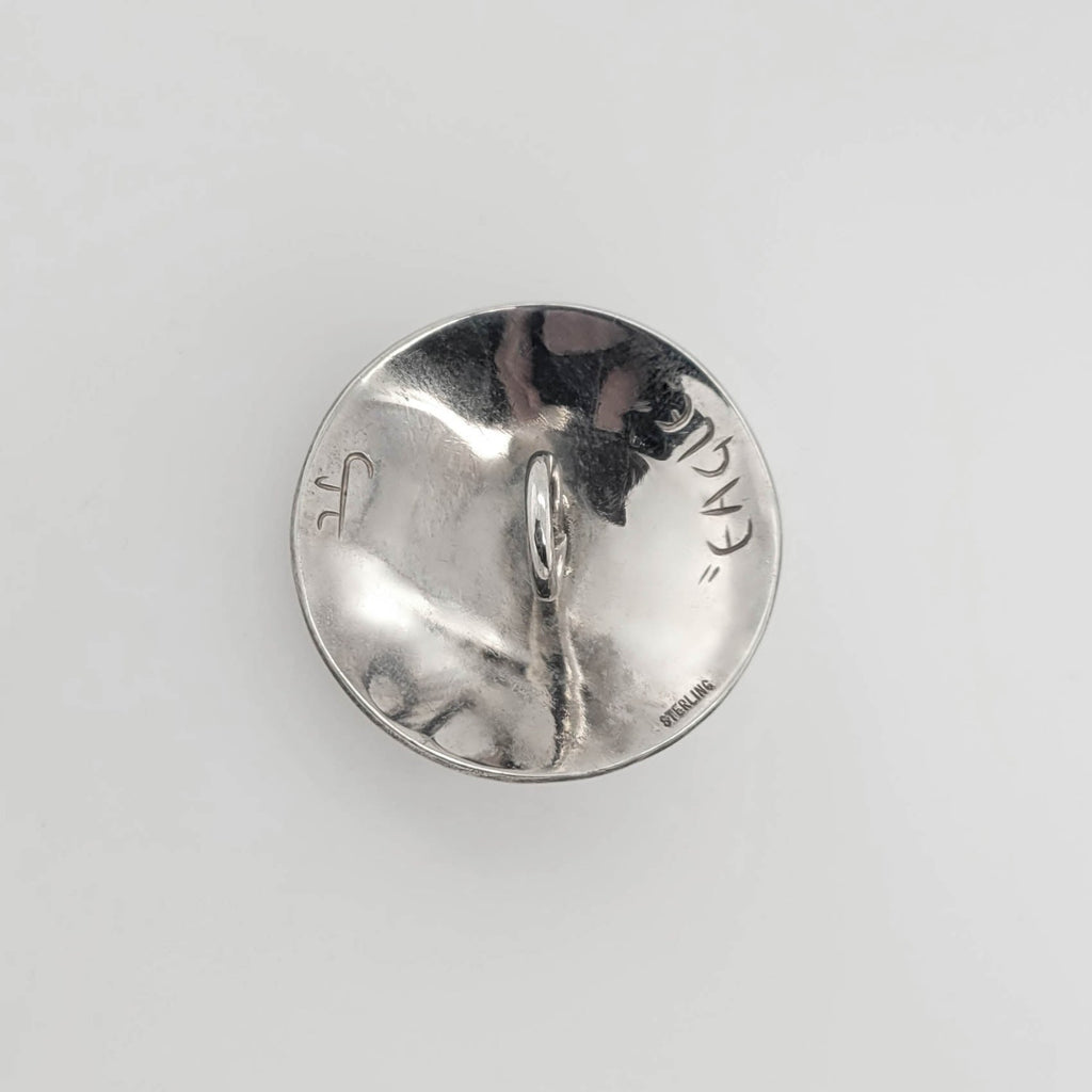 Silver Eagle Pendant with Garnet by Kwakwaka'wakw artist Chris Cook