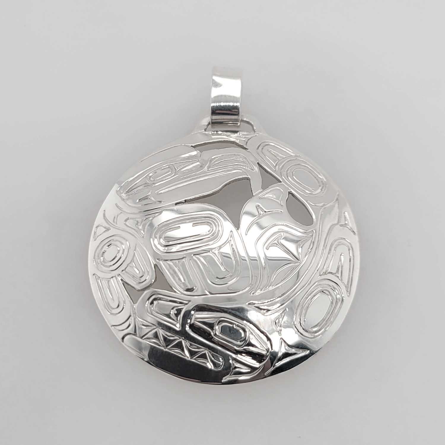 Silver Eagle and Orca Pendant by Haida artist Garner Moody