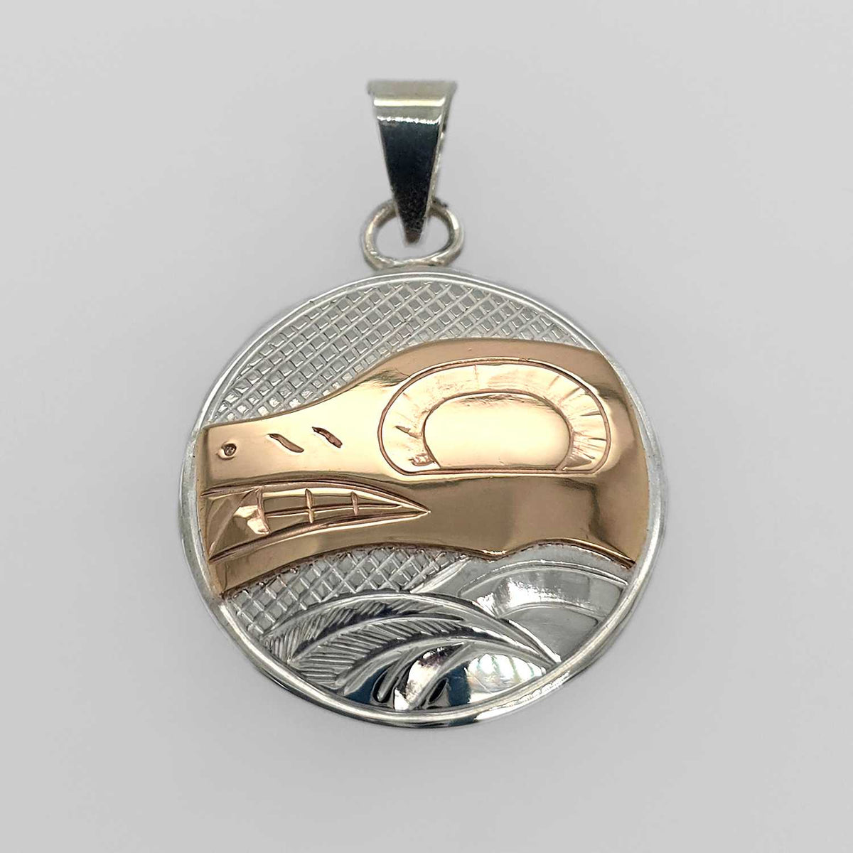 Silver and Gold Round Wolf Pendant by Cree artist Justin Rivard ...
