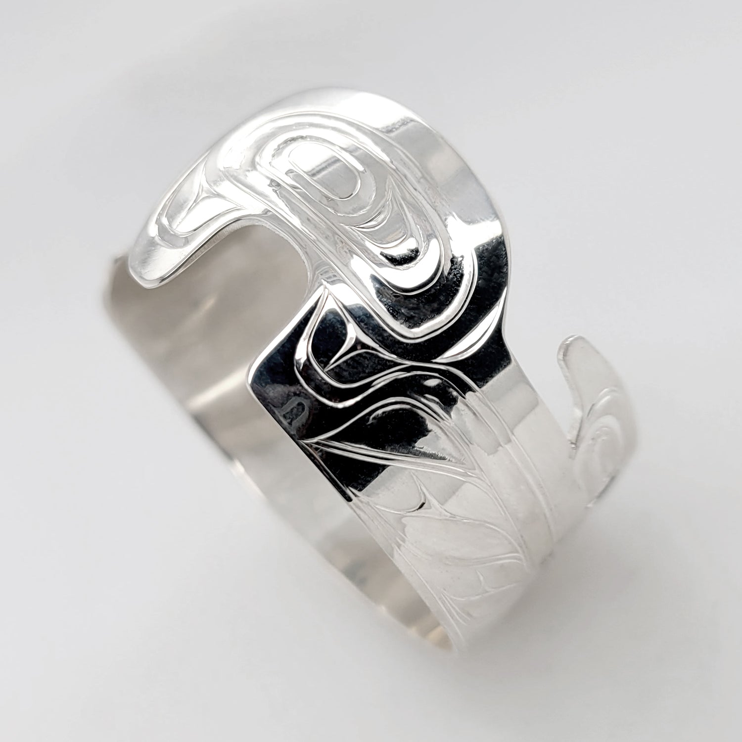 Silver Killer Whale Bracelet by Nuxalk artist Kelly Robinson