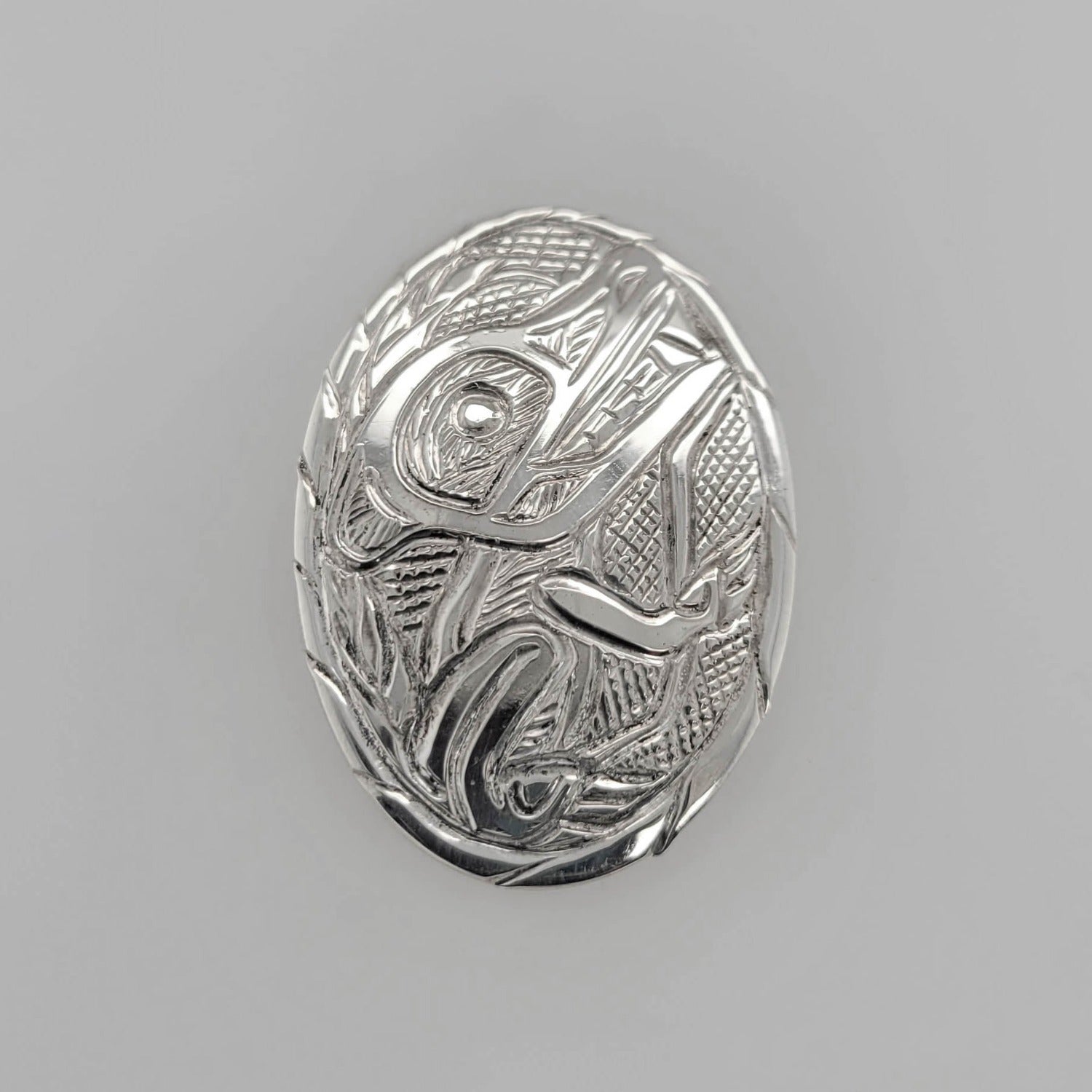 Silver Oval Wolf Pendant by Tsimshian artist Bill Helin