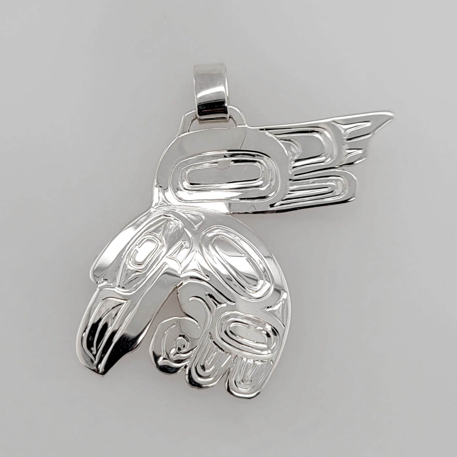 Silver Flying Raven Pendant by Haida artist Garner Moody