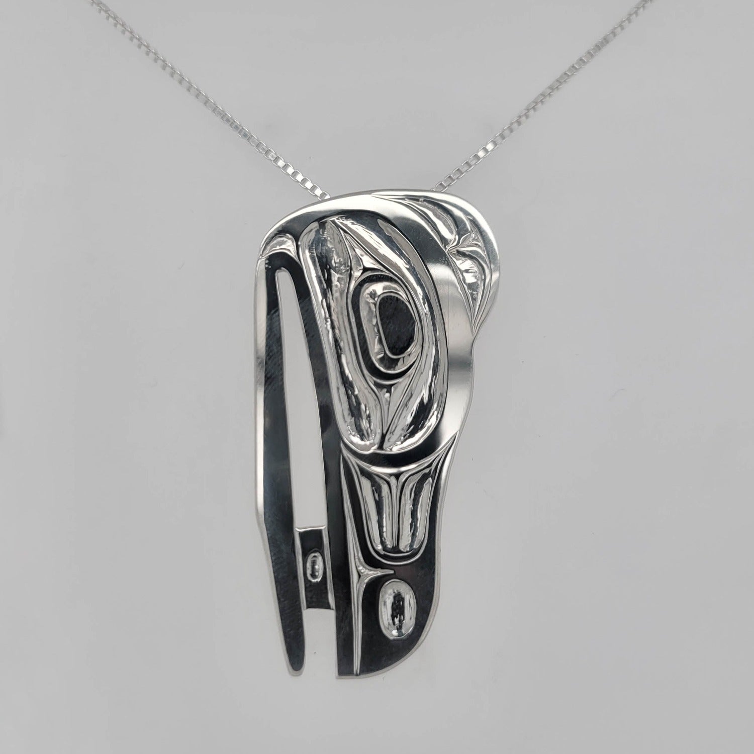 Silver Raven Steals the Light Pendant by Haida artist Robin Rorick