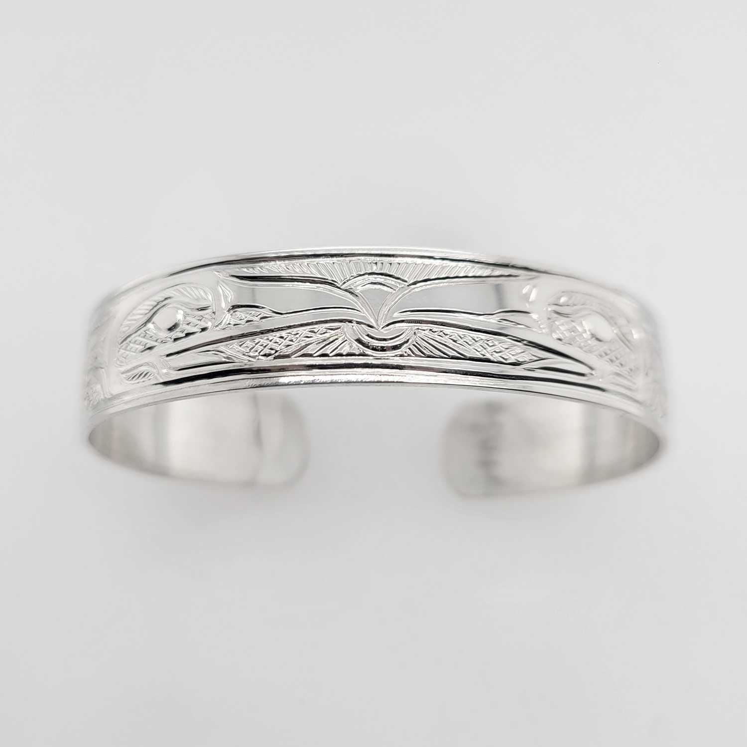 Silver Ravens Bracelet by Tsimshian artist Bill Helin