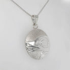 Silver Bear Pendant by Cree artist Justin Rivard