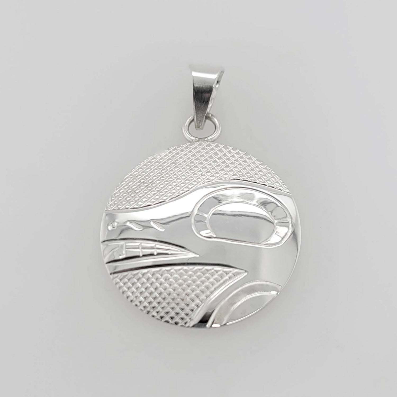 Silver Wolf Pendant by Cree artist Justin Rivard