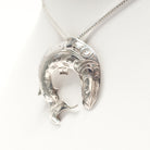Silver Salmon Pendant by Kwakwaka'wakw artist Harold Alfred